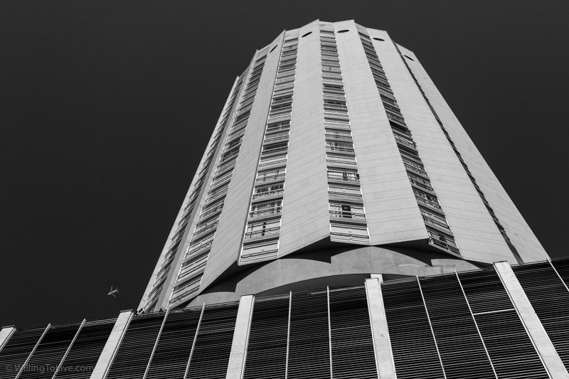 Court of Justice building with an airplane. | 45mm equiv.; f8; 1/500; ISO 100